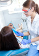 © Sergey Mironov - woman dentist working