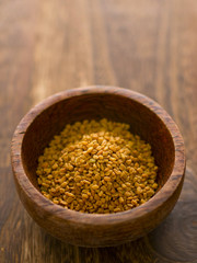 Sticker - close up of a bowl of fenugreek seeds