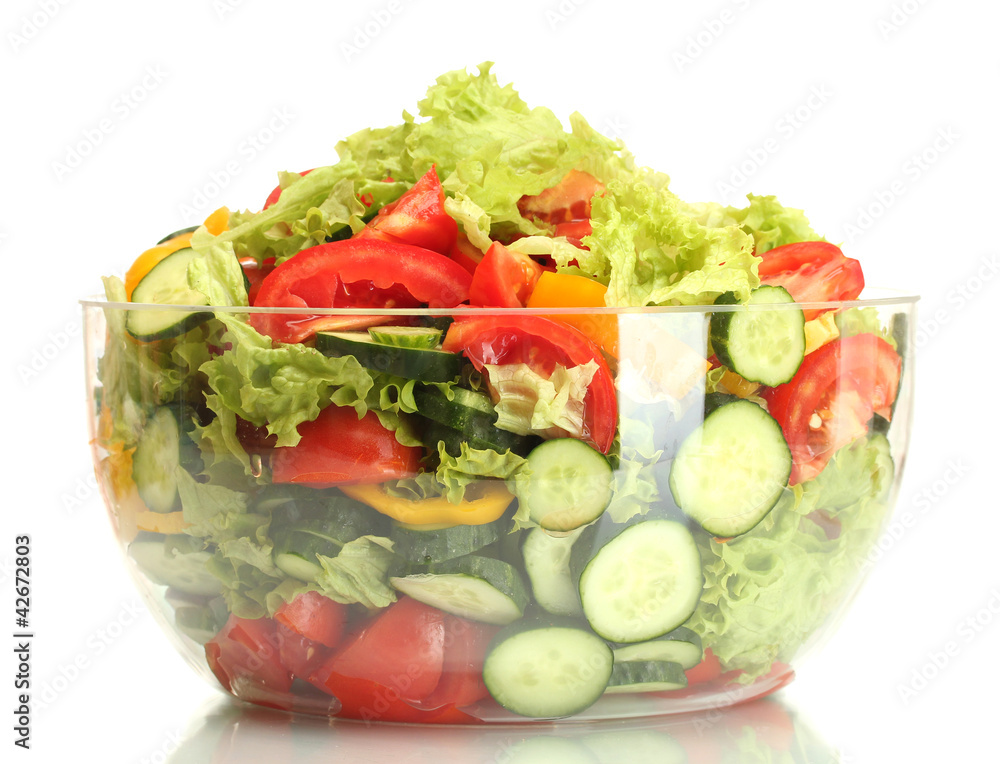 fresh vegetable salad in transparent bowl isolated on white