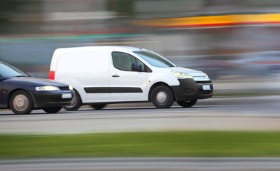 Wall Mural - Blur white van,  panning, blur and move