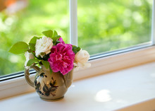 Beautiful Bouquet Of Roses On A Window Sill
