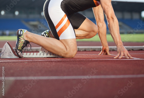 Fototapeta dla dzieci Sprinter getting ready to start the race