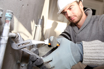 Wall Mural - plumber working