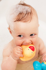 adorable bath baby with soap suds