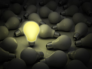 Fototapete - Leadership concept, Lit light bulb amongs unlit bulbs