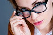 © Elena Kharichkina - Beautiful business woman with glasses. Close-up portrait