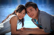 © stockphoto mania - couples of asian man and woman at water pool