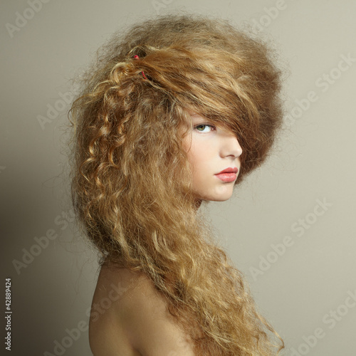 Fototapeta na wymiar Portrait of beautiful woman with elegant hairstyle