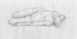 Human lying figure of a naked woman, charcoal sketch