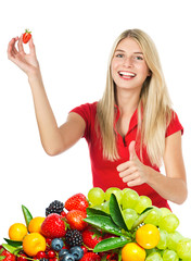 young beautiful woman with fresh fruits and berries