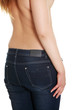 © Piotr Marcinski - Naked back and waist of young woman with jeans.