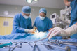 © Wavebreak Media - Focus shot of a surgical tray in an operating theater