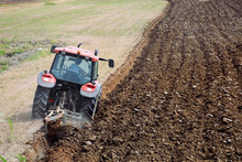 Tractor Plowing The Field