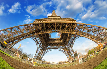 Wall Mural - Wide angle upward view of Eiffel Tower in Paris