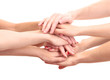 © Africa Studio - group of young people's hands isolated on white