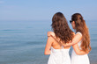 © william87 - Two Female Friends Looking Horizon at Seaside