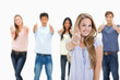 © WavebreakmediaMicro - Close-up of people smiling and approving with one woman in foreg