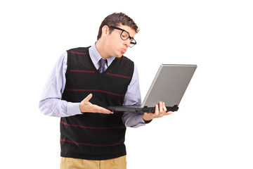 Sticker - Young adult man giving a kiss and looking at a laptop computer