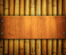 Wood Board On Bamboo Background