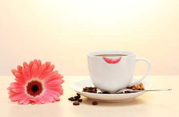 Poster - cup of coffee with lipstick mark and gerbera beans, cinnamon