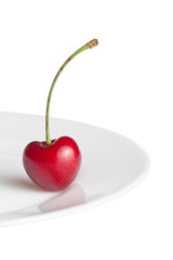 Wall Mural - Cherry in form heart on plate