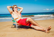 © EpicStockMedia - Young Man Relaxing at the Beach