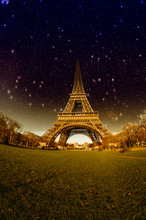 Stars And Night Sky Above Eiffel Tower In Paris