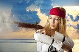 Young woman pirat shooting
