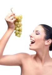 Sticker - Healthy woman eating grapes smiling