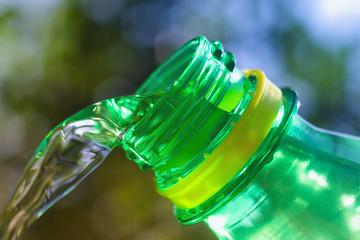 Close up of water flowing from bottle