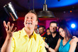 © Kzenon - Barkeeper in a pub is mixing cocktails or drinks