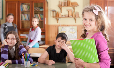 Canvas Print - Pretty teen schoolgirl in front of class