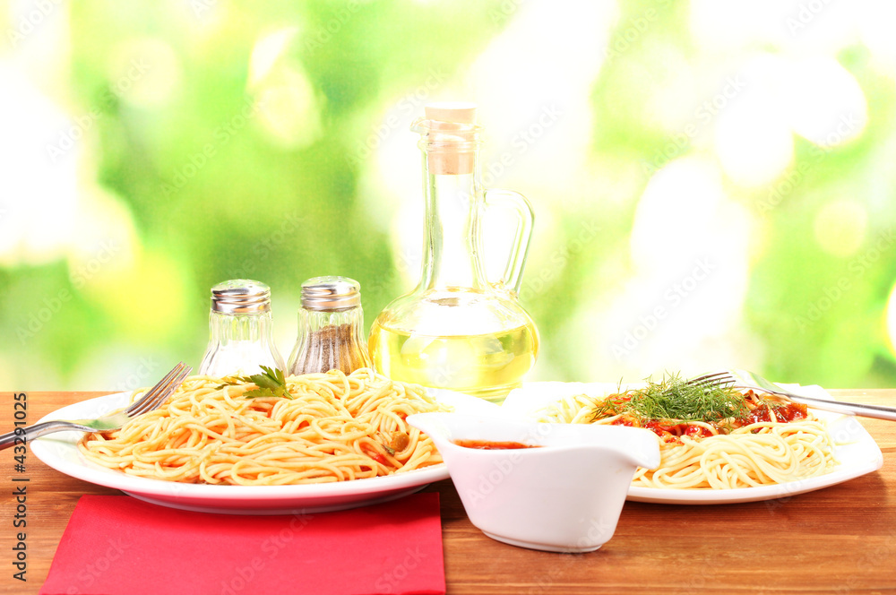 composition of delicious cooked spaghetti with tomato sauce
