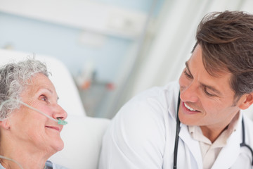 Wall Mural - Close up of a doctor looking at a patient