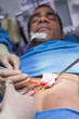 © WavebreakmediaMicro - Close up of a patient having a surgery