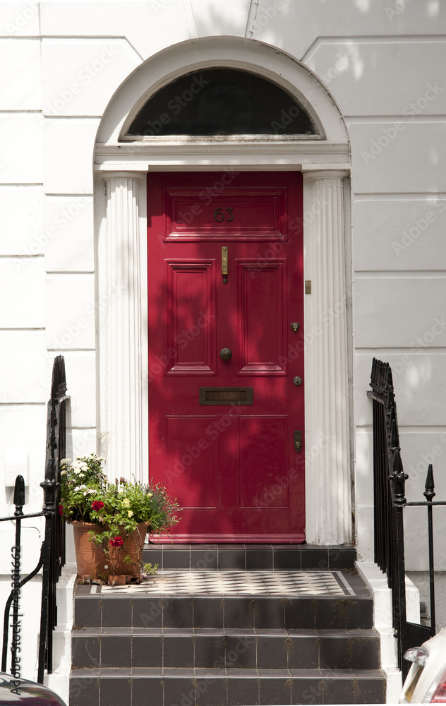 Nowoczesny obraz w ramie Tradycyjne czerwone drzwi wejściowe domu w  Londynie - PIXSHOP.PL