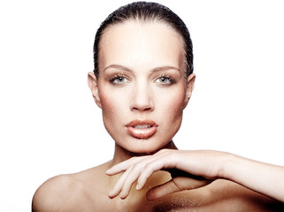 Gorgeous woman with water drops on face