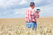 © Edler von Rabenstein - Farmer with computing machine in the field