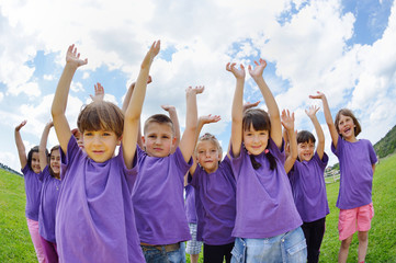 Wall Mural - happy kids group  have fun in nature