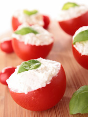 Canvas Print - stuffed tomato with cheese and basil