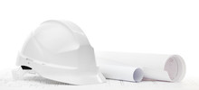 White Hard Hat Near Working Or Engineering Drawings
