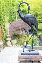 Bronze Crane Statue In Asian Inspired Garden