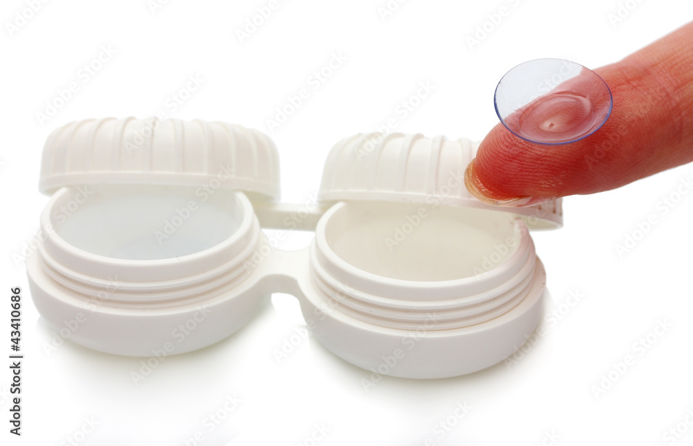 contact lens on finger and case isolated on white