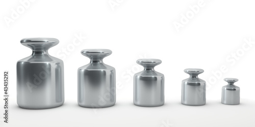 Fotografia Row of calibration weights isolated on white.