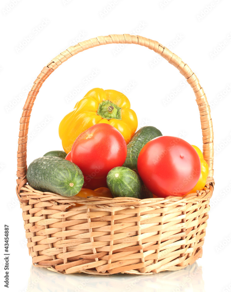 fresh vegetables in basket isolated on white
