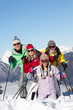 © Monkey Business - Teenage Family On Ski Holiday In Mountains