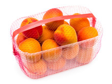 Apricots In Plastic Container Isolated On White