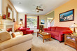 © Iriana Shiyan - Peach and red beautiful living room interior with fireplace.