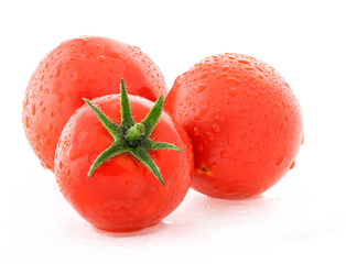 Wall Mural - Red tomatoes isolated on white background