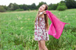 © pikselstock - Woman with scarf on meadow